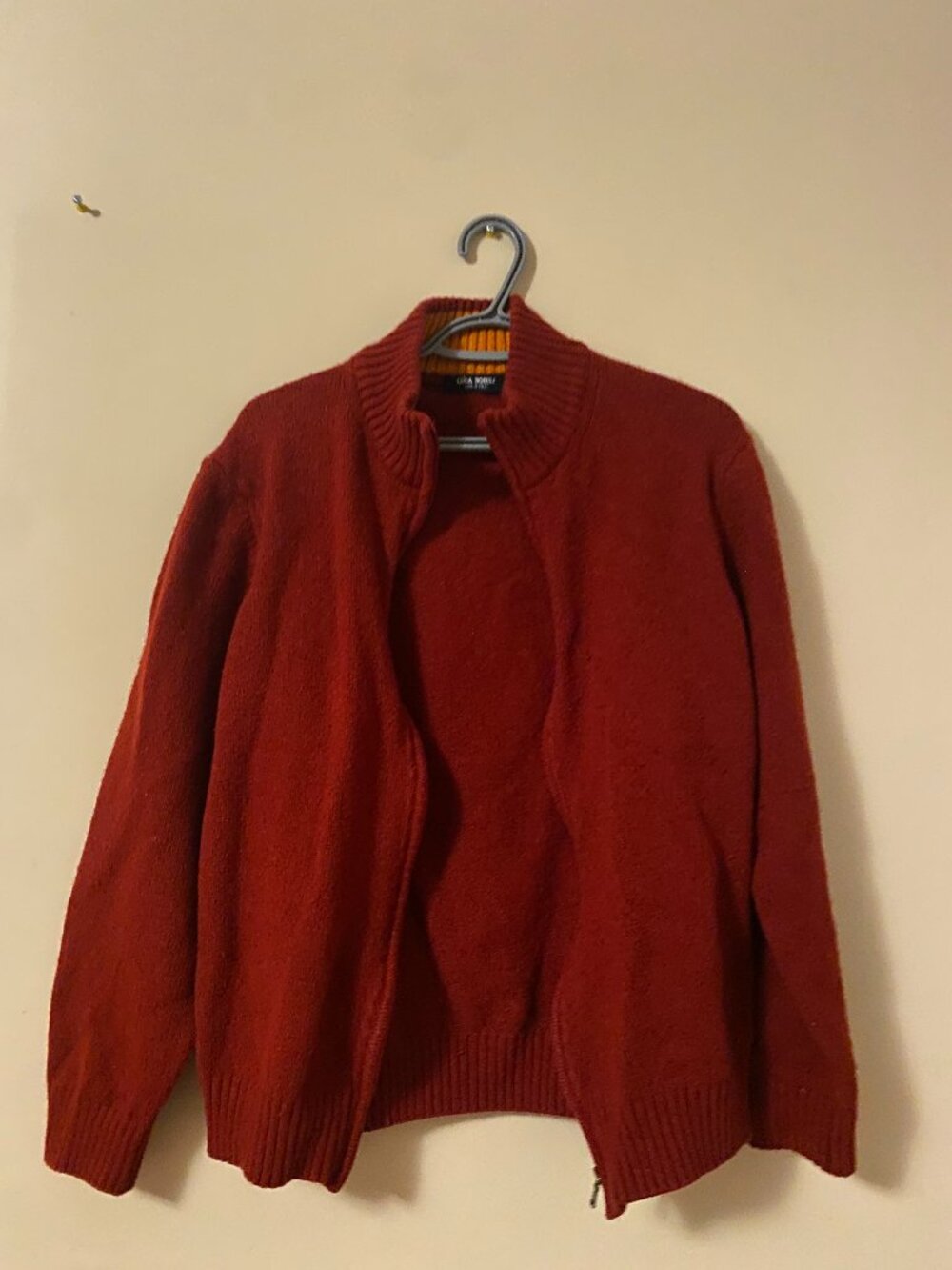 red zip up sweater